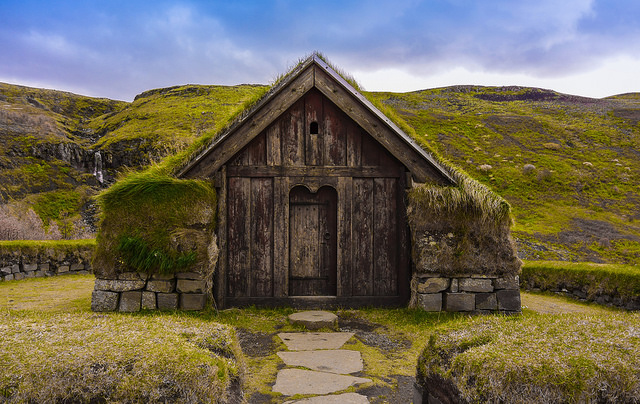 Traditional Icelandic grass house with wooden doors